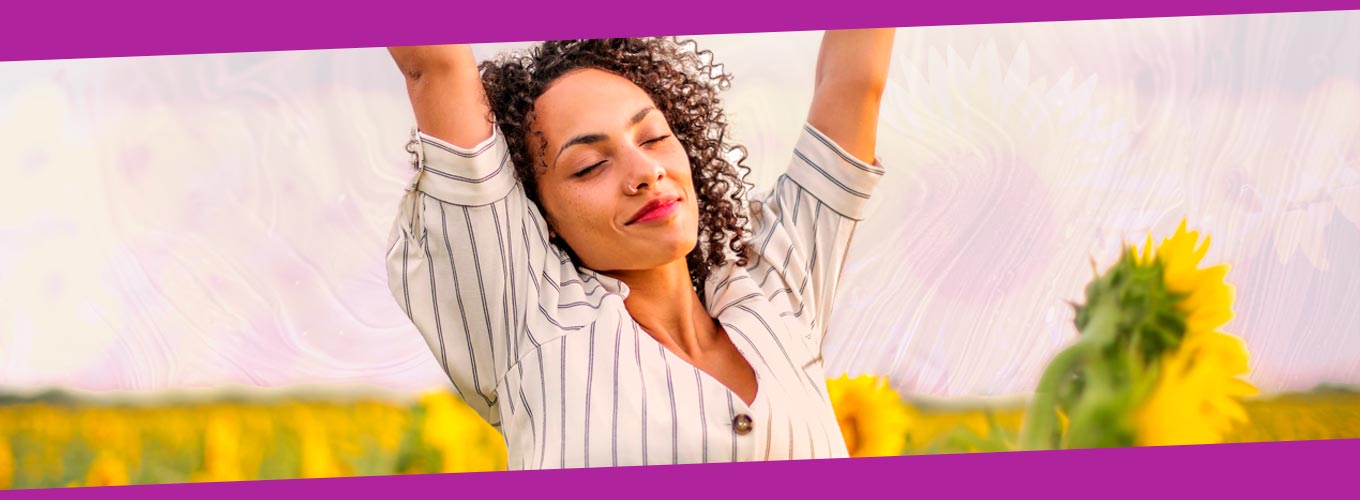 meditação para um dia positivo - mulher com girassóis